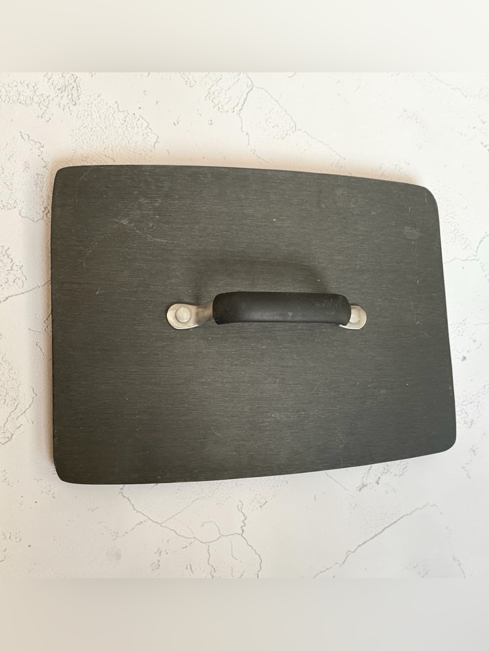 Grill press with rubber coated handle